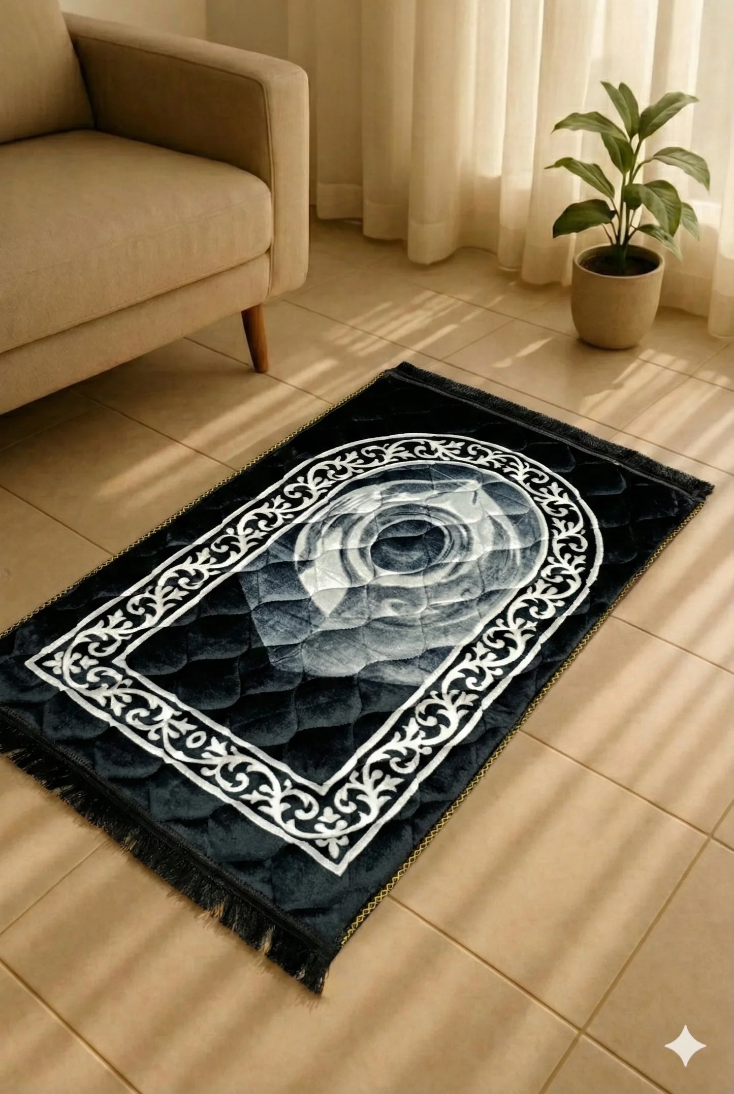 Black Islamic prayer mat with white floral border design on tiled floor near beige sofa and potted plant
